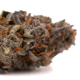 Close-up of Jokerz NOS indoor cultivation hemp flower with dense buds, orange hairs, and frosty trichomes